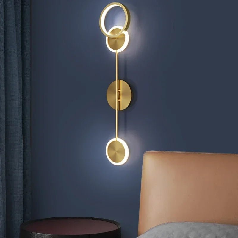 Applique murale ronde en fer avec diffuseur acrylique doré LED - Lumeria