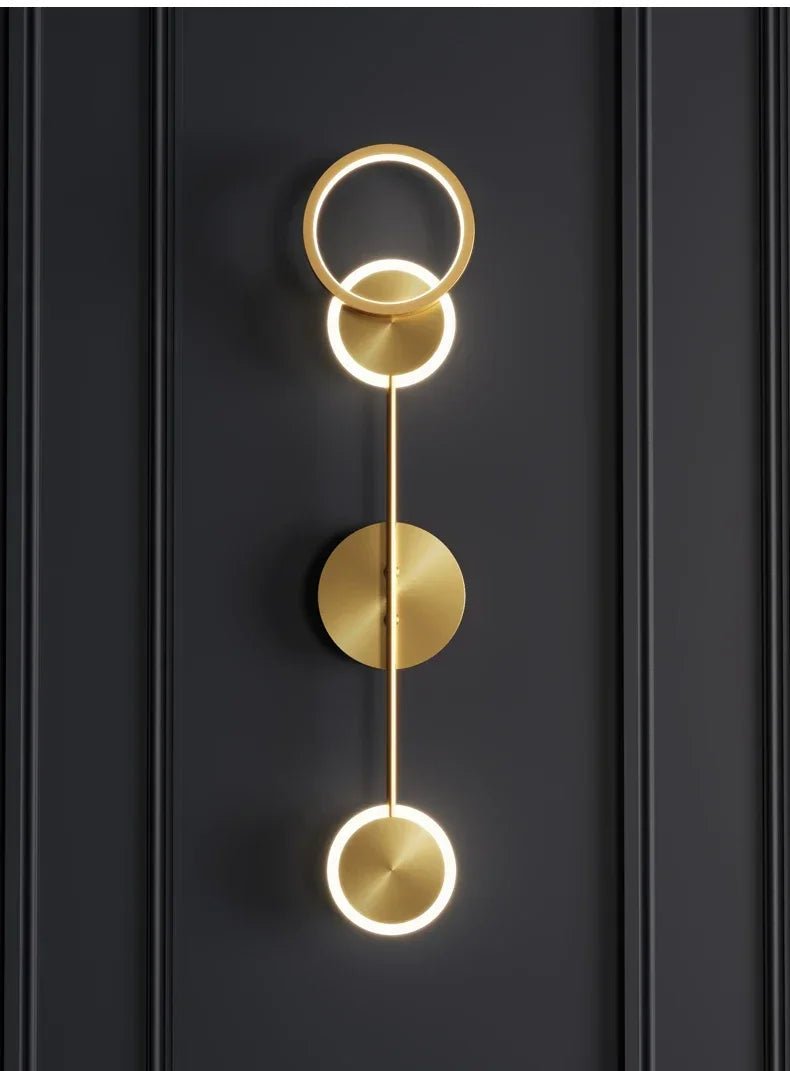Applique murale ronde en fer avec diffuseur acrylique doré LED - Lumeria