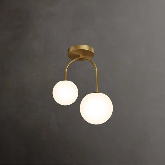 Plafonnier double globe en verre clair avec métal doré scandinave - Lumeria